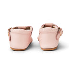 Baby wearing baby shoes — Wisp Pink Leather Baby T Bar Shoe