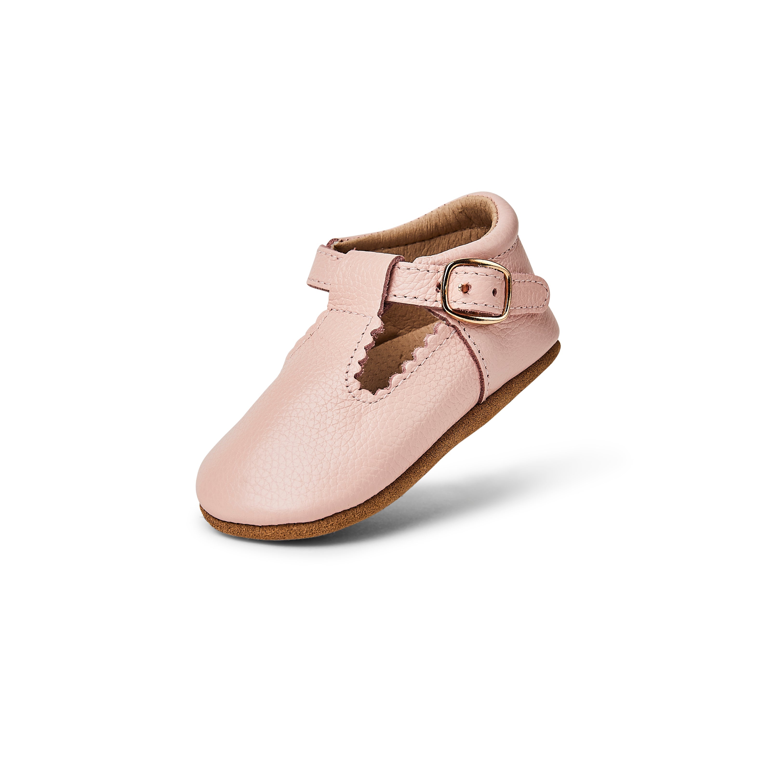 Wisp Pink Leather Baby T Bar Shoe — baby shoes styled flat lay with nursery accessories