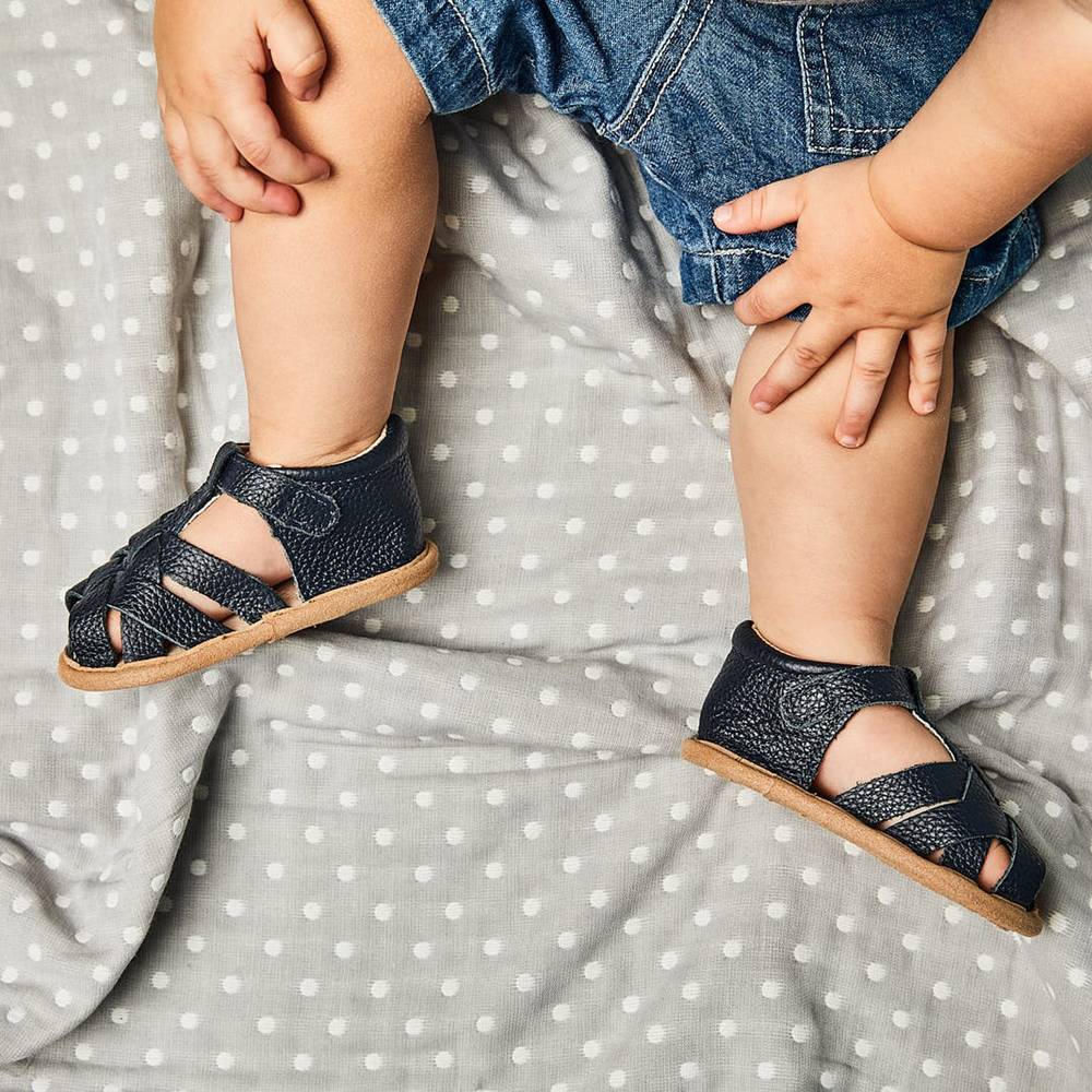 Zodiac Blue Leather Baby Sandal — baby sandals styled flat lay with nursery accessories