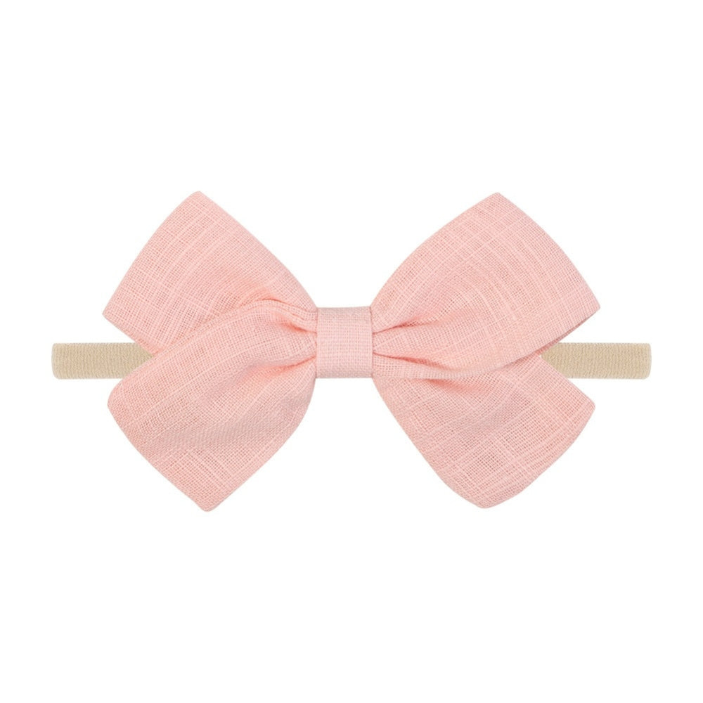 Tinka Tiny Bow in Coral Pink