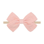 Tinka Tiny Bow in Coral Pink