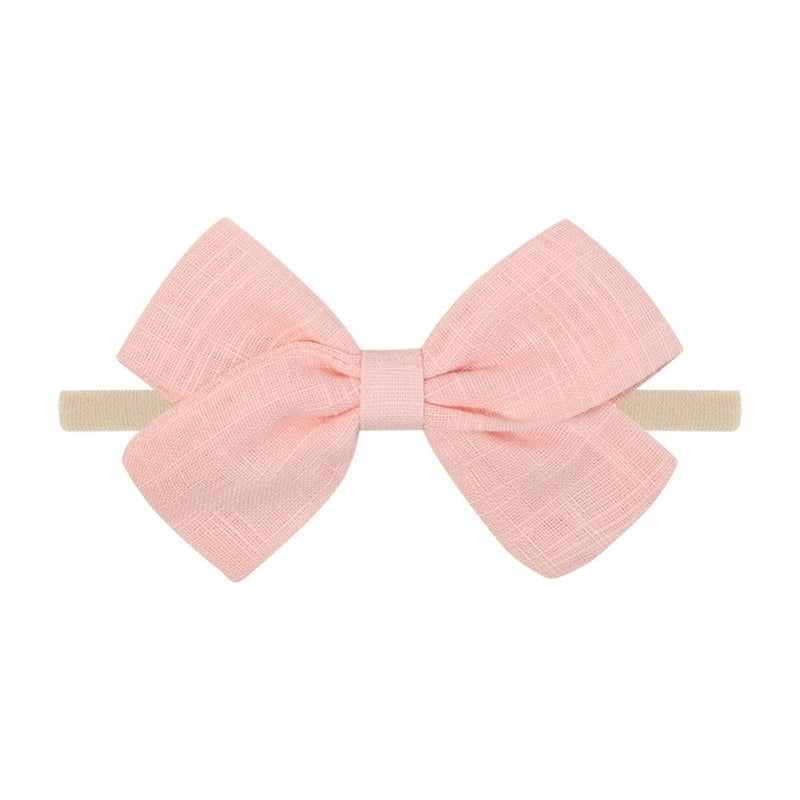 Tinka Tiny Bow in Coral Pink