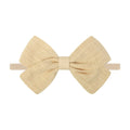 Tinka Tiny Bow in Tan
