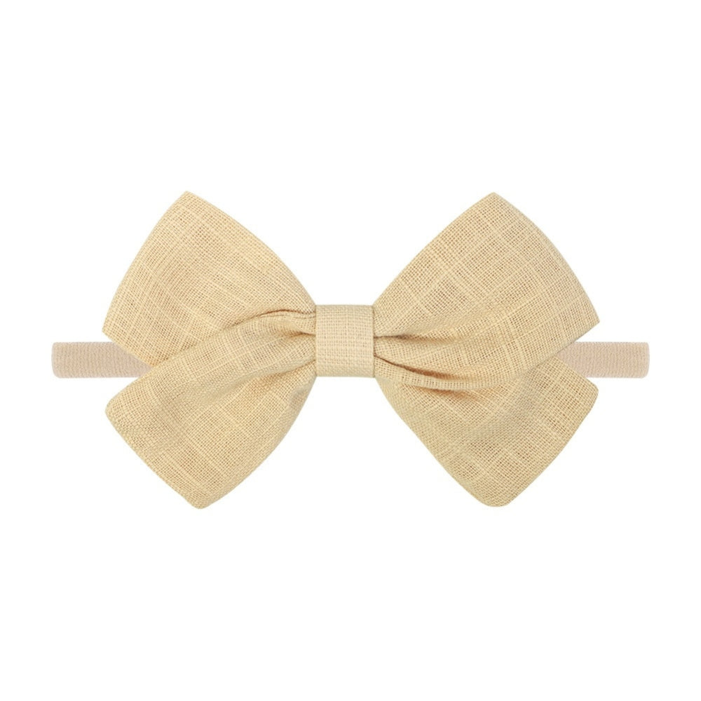 Tinka Tiny Bow in Tan