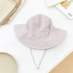 Wide Brim Baby Sun Hat in Vintage Pink — cat baby hat showing face and soft texture