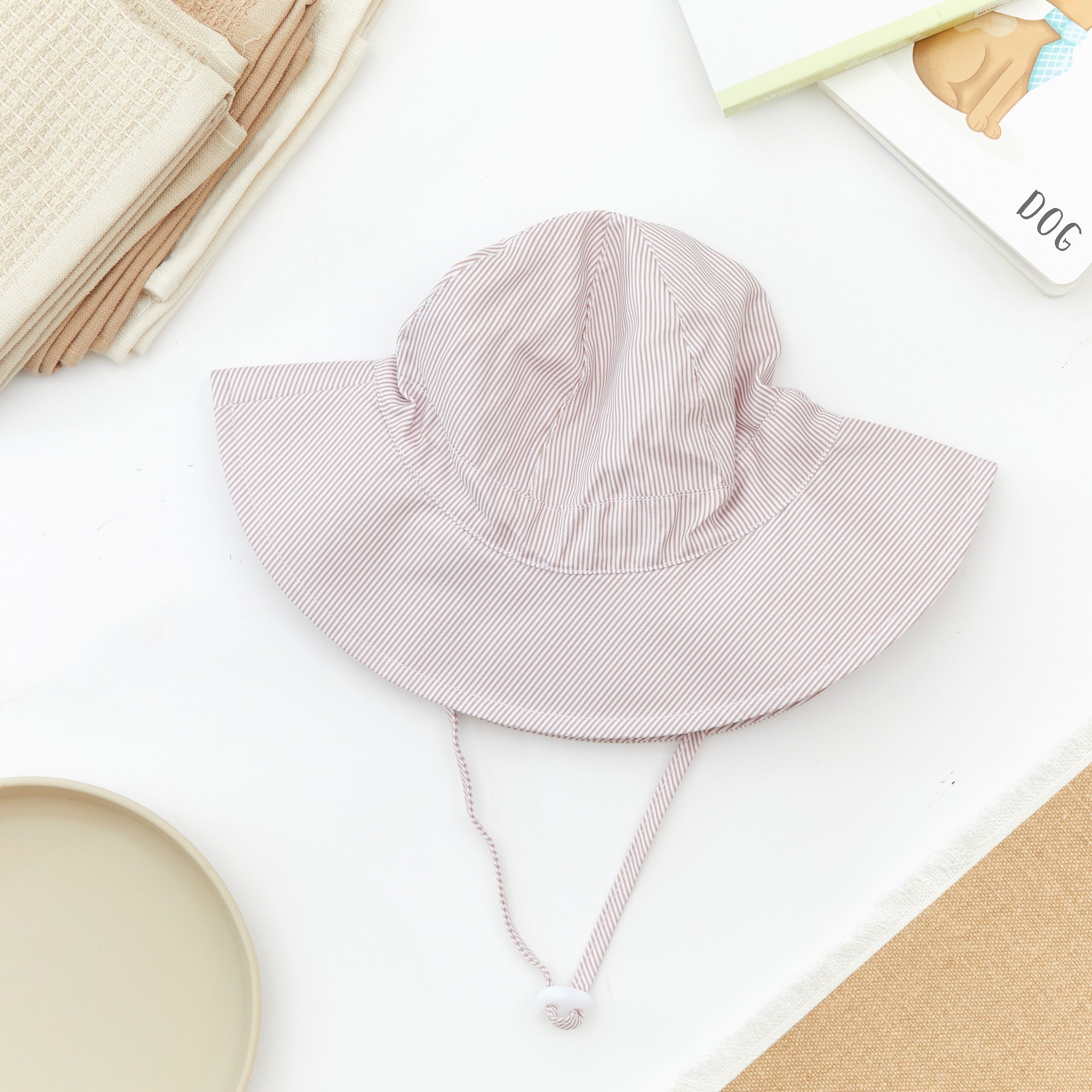 Wide Brim Baby Sun Hat in Vintage Pink — cat baby hat showing face and soft texture
