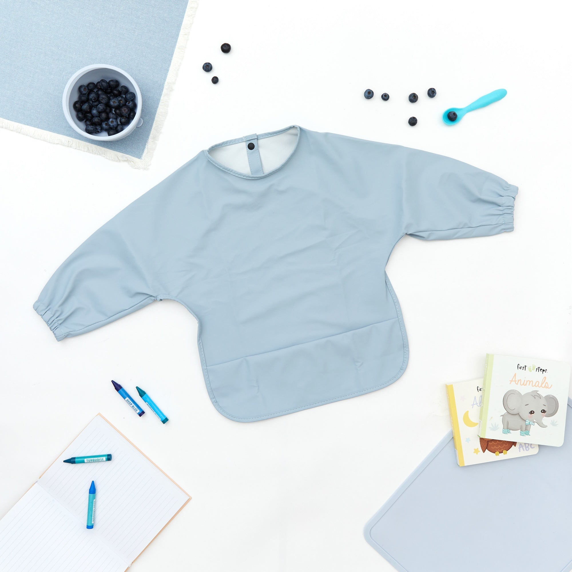 Bubble Blue Waterproof Baby Smock Bib Long Sleeve — cat baby bib showing face and soft texture