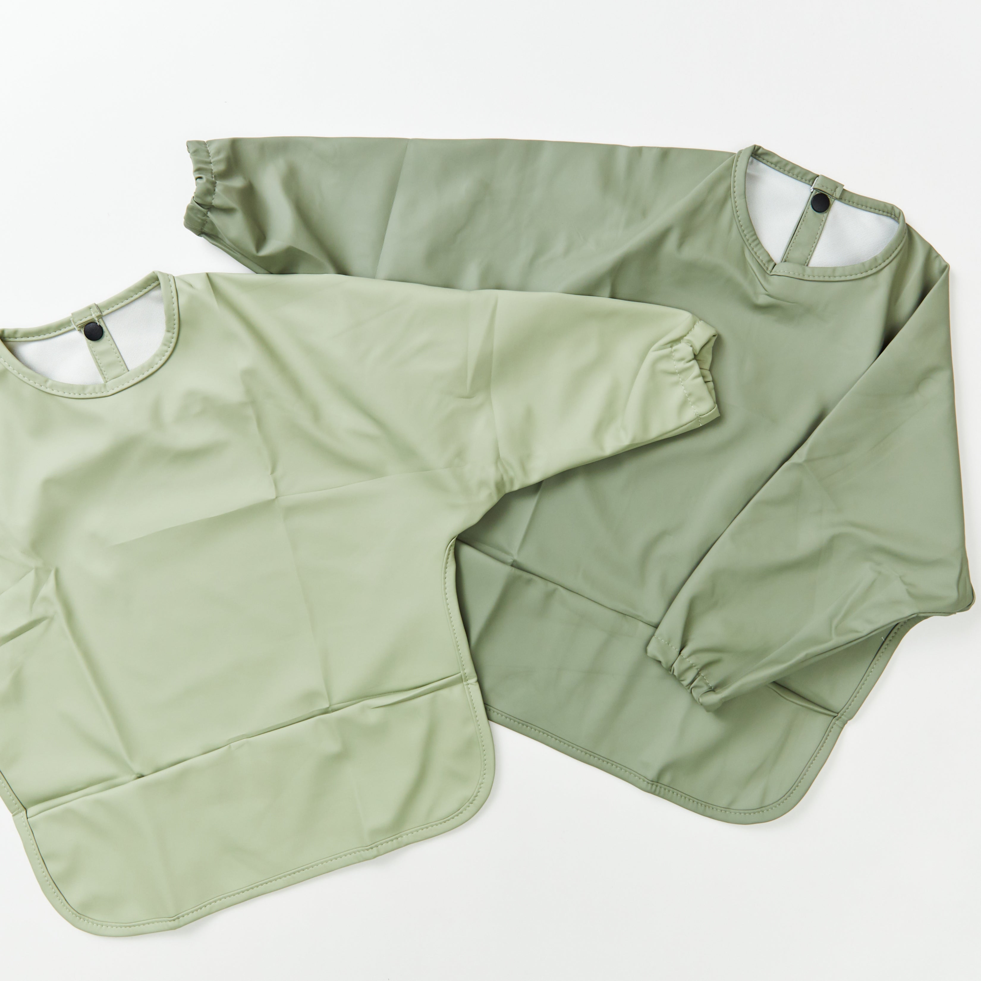 Green Smoke Waterproof Baby Smock Bib Long Sleeve — detail shot showing fabric texture and quality