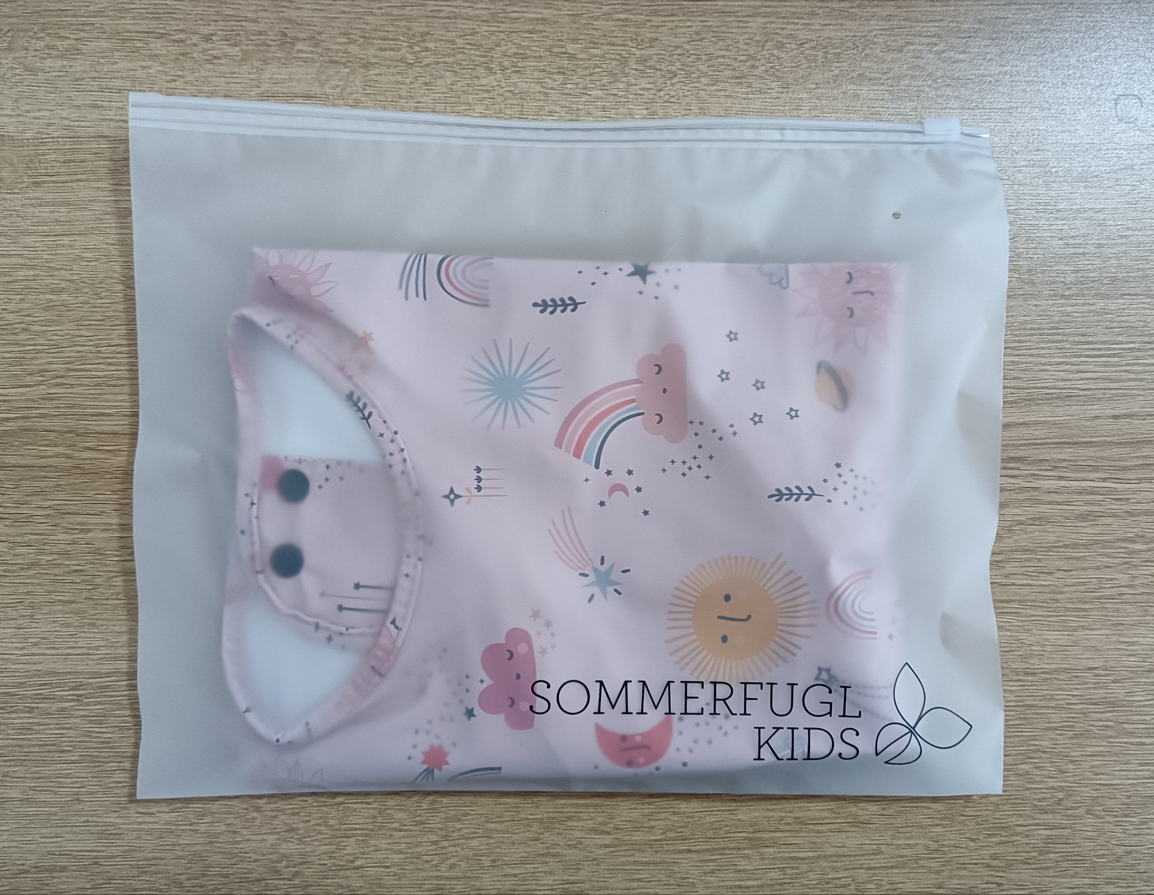 Rainbow Rays Waterproof Baby Smock Bib Long Sleeve — cat baby bib showing face and soft texture