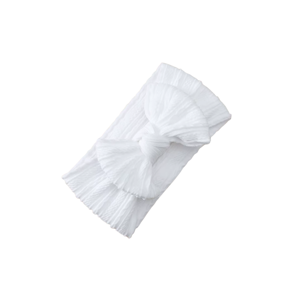 Snow white nylon knotted bow baby headband — Mila Top Knot Bow Headband on white background