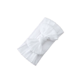 Snow white nylon knotted bow baby headband — Mila Top Knot Bow Headband on white background