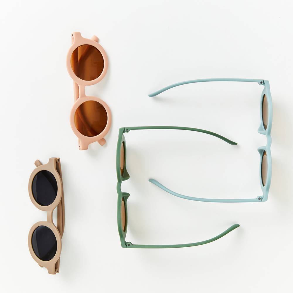 Toddler wearing baby sunglasses in sunlight — Matte Flamingo Ava Baby Sunglasses