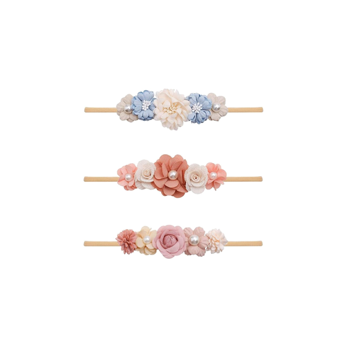 Three blue and coral pearl flower baby headbands from the Lark bluebell set