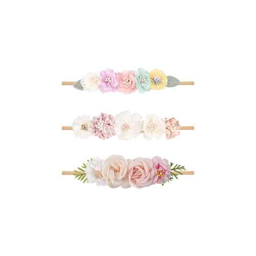 Three pastel rainbow floral baby headbands from the Lark meadow set