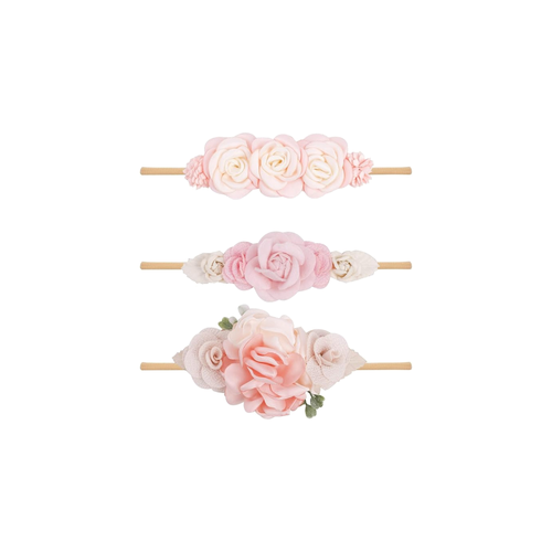Three blush and pink rose floral baby headbands from the Lark rosette set