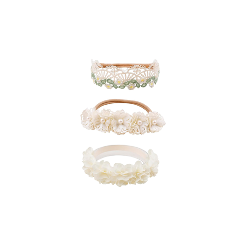Three white lace crown and pearl daisy baby headbands from the Lark blanc set