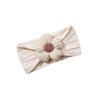 Chalk on chalk tonal cable knit flower baby headband on white background