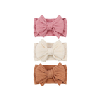 Bohemian cable knit double bow baby headband 3-pack in flamingo, chalk and rust