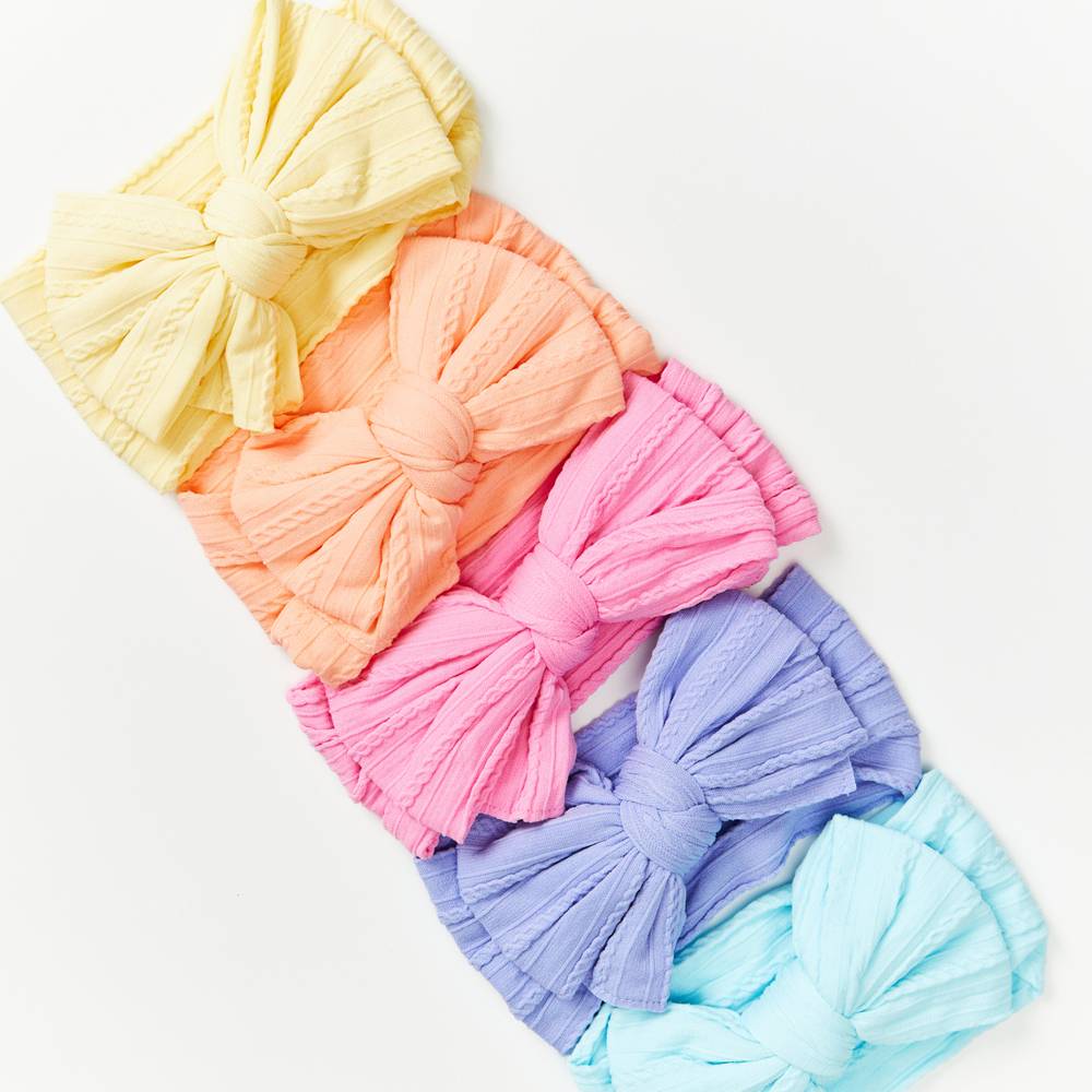 Bowie Double Bow Headband in Mint Green — baby headband close-up showing nylon