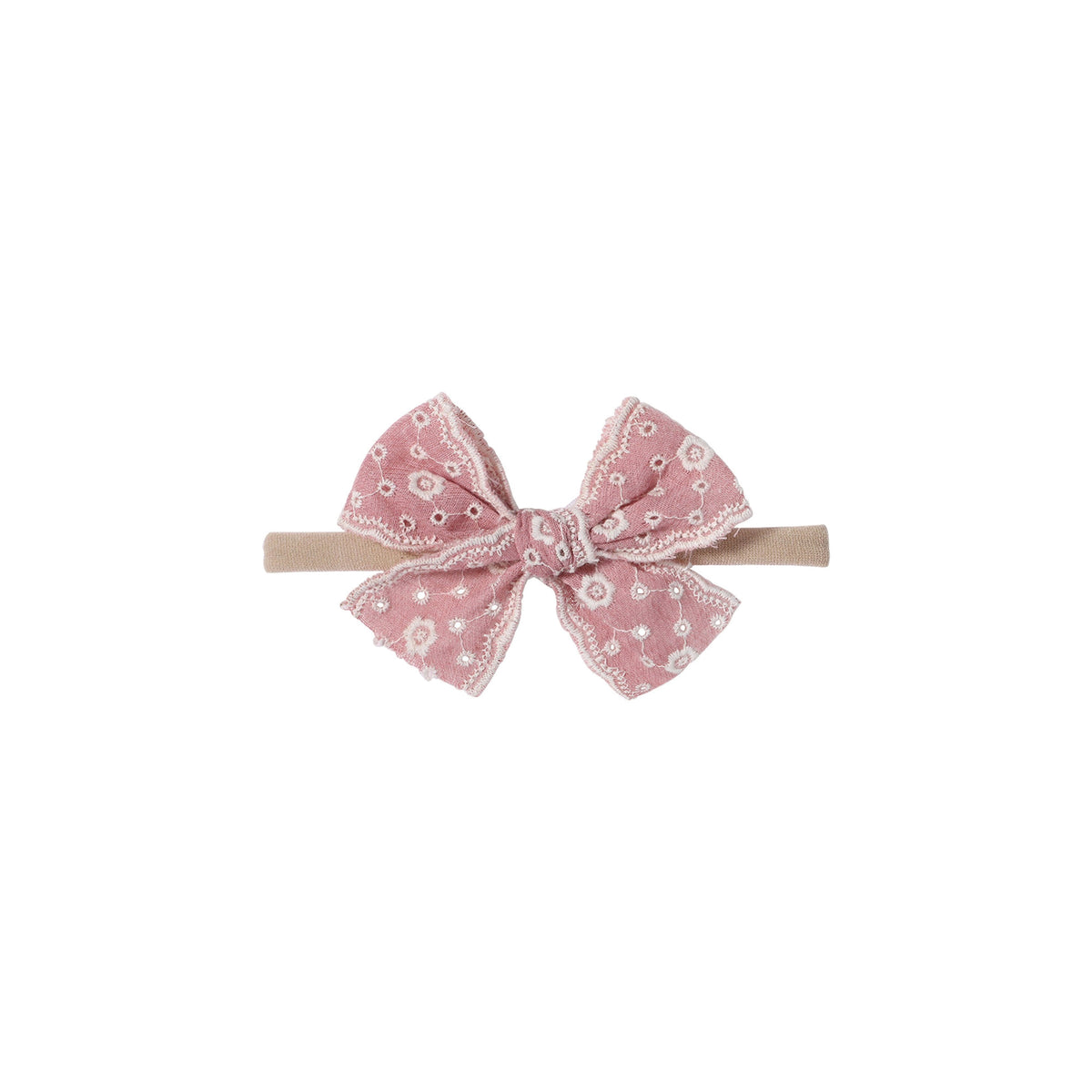Dorothea eyelet baby bow headband in flamingo, thick broderie anglaise bow with embroidered flower eyelets and scalloped edges on a soft nylon band, Sommerfugl Kids