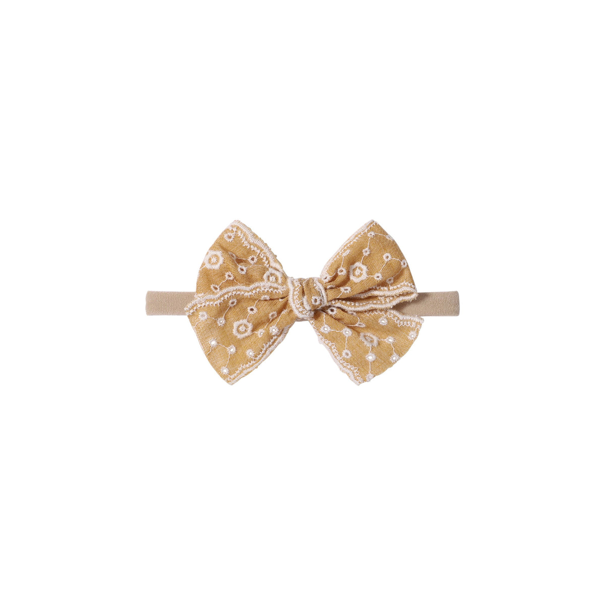 Dorothea eyelet baby bow headband in mustard, thick broderie anglaise bow with embroidered flower eyelets and scalloped edges on a soft nylon band, Sommerfugl Kids