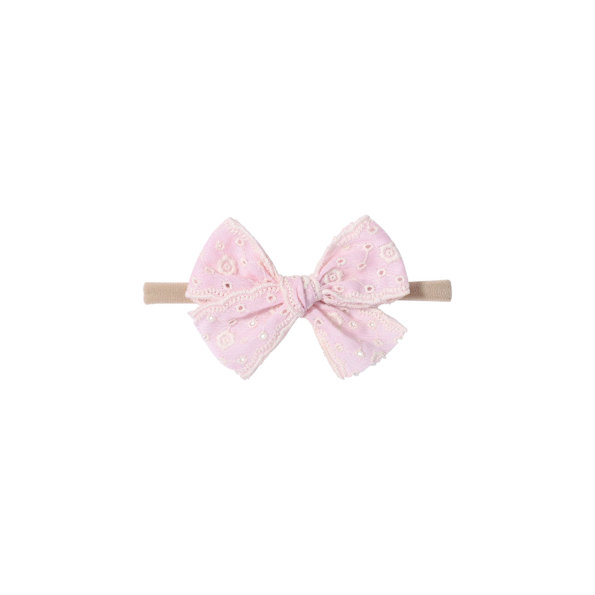 Dorothea eyelet baby bow headband in peony, thick broderie anglaise bow with embroidered flower eyelets and scalloped edges on a soft nylon band, Sommerfugl Kids