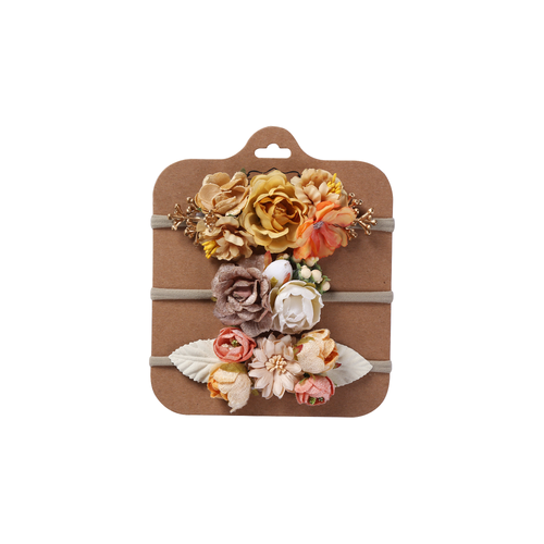 Three mustard, gold and peach floral baby headbands from the Florence mustard set