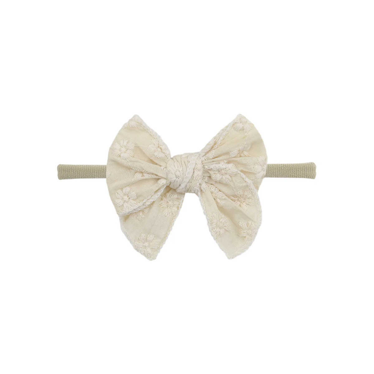 Cream eyelet oversized bow baby headband on thin nylon band