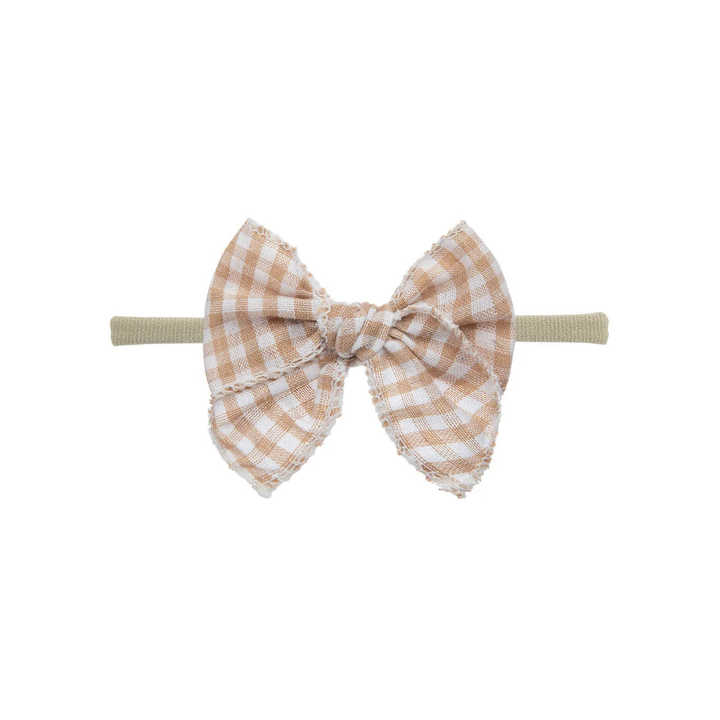 Sand gingham check oversized bow baby headband on thin nylon band