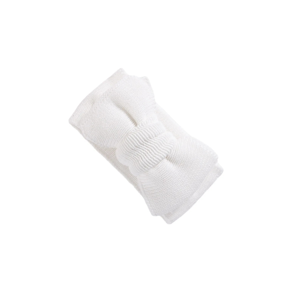 White cotton oversized bow baby headband — Stevie Baby Bow Headband on white background