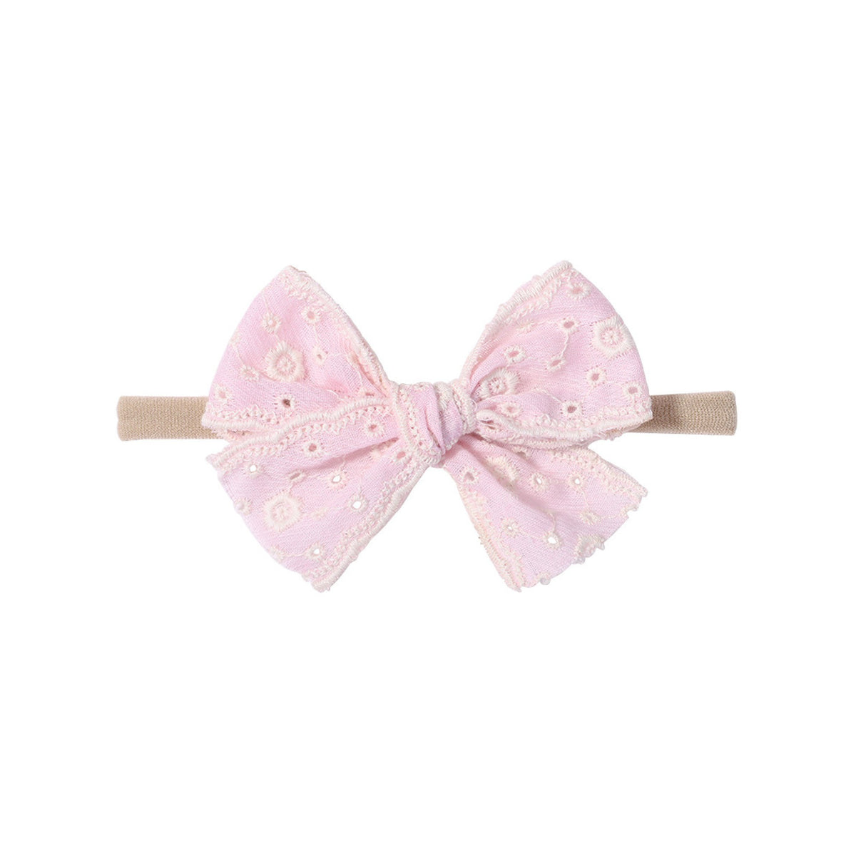 Lacey eyelet baby bow headband in peony pink, broderie anglaise bow with tone-on-tone embroidered eyelets and scalloped edges on a soft nylon band, Sommerfugl Kids