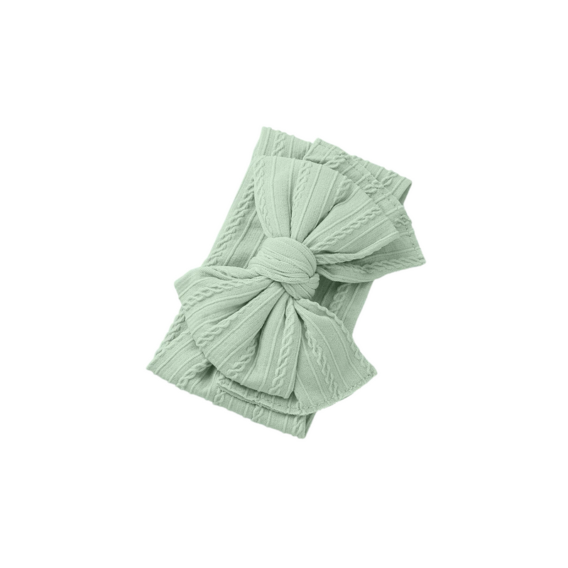 Bowie Double Bow baby headband in Laurel Green , soft ribbed knit with re-tieable double bow