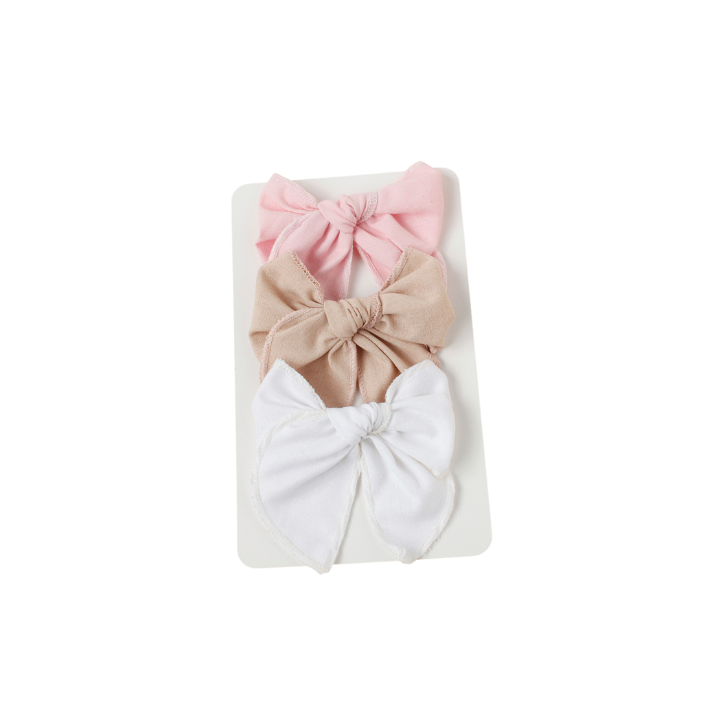 Sweet Pea baby hair clip 3-pack with candy pink, tan and white fabric bows on display card