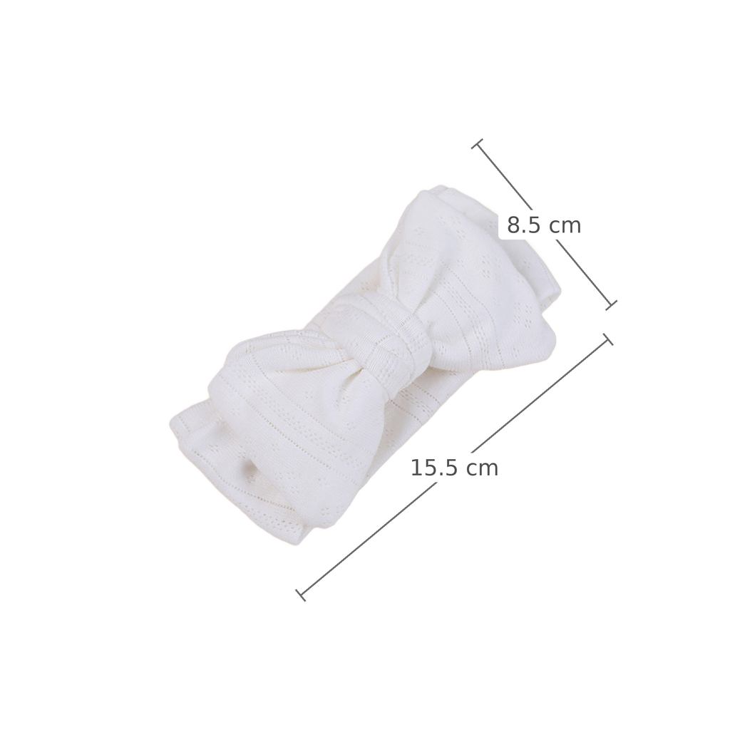 Pixie pointelle baby bow headband in white, measurements 15.5 cm x 8.5 cm