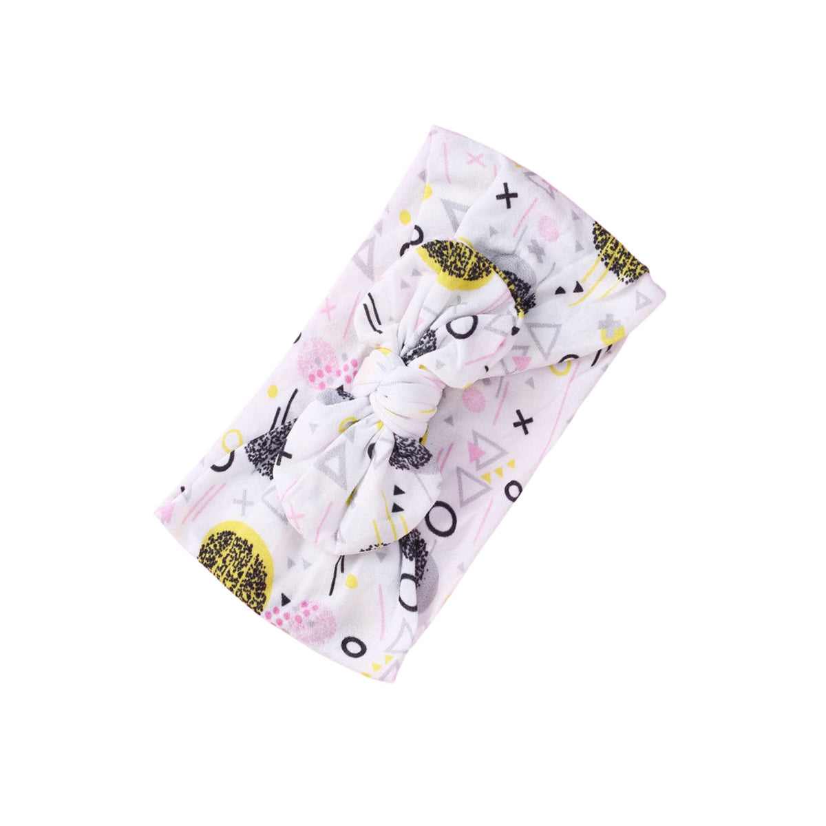 Memphis print nylon bow baby headband with yellow, black, pink and grey geometric shapes on white, knotted bow at front, Sommerfugl Kids