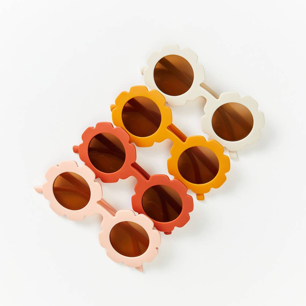 Matte Latte Quinn Baby Sunglasses — detail shot showing fabric texture and quality
