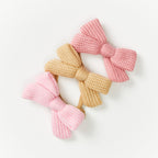 Baby Knitted Bow Headband in Latte — baby headband close-up showing bow