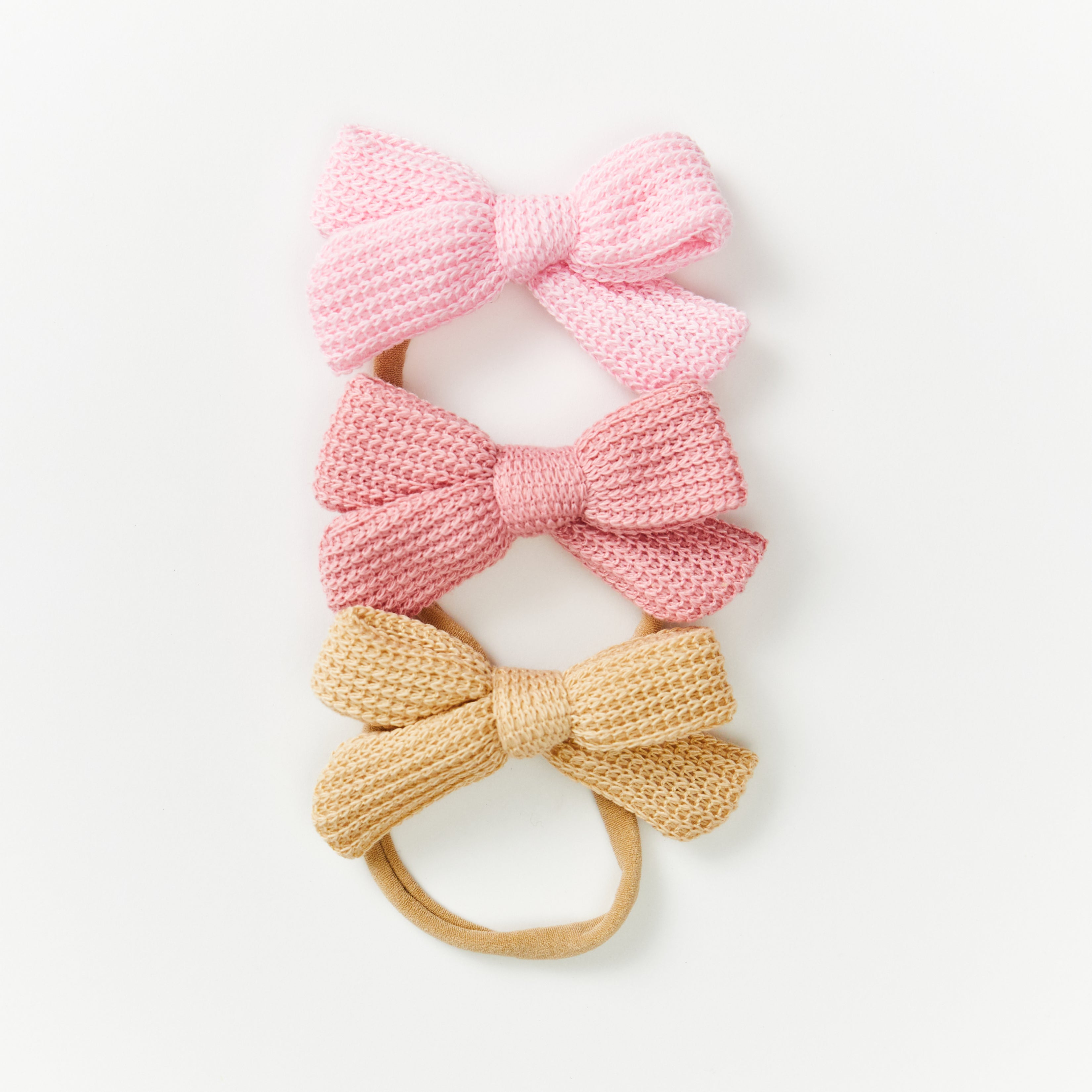 Baby girl wearing fairy floss baby headband with bow — Baby Knitted Bow Headband