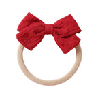 Strawberry cotton embroidered baby accessory — Dotty Embroidered Cotton Baby Bow on white background