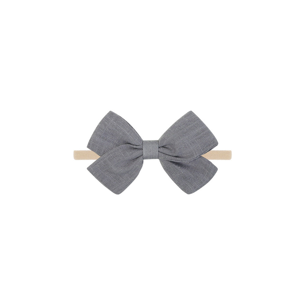 Tinka tiny bow baby headband in charcoal