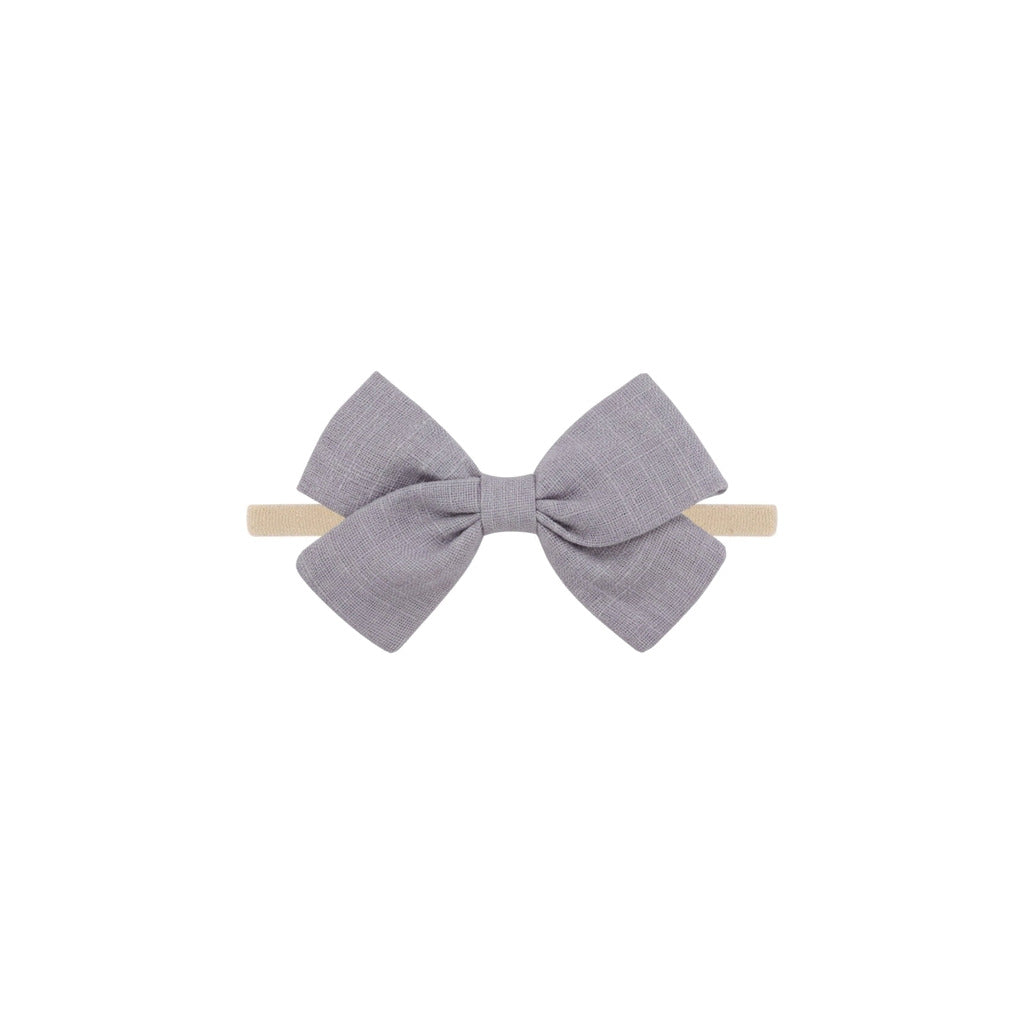 Tinka tiny bow baby headband in grey