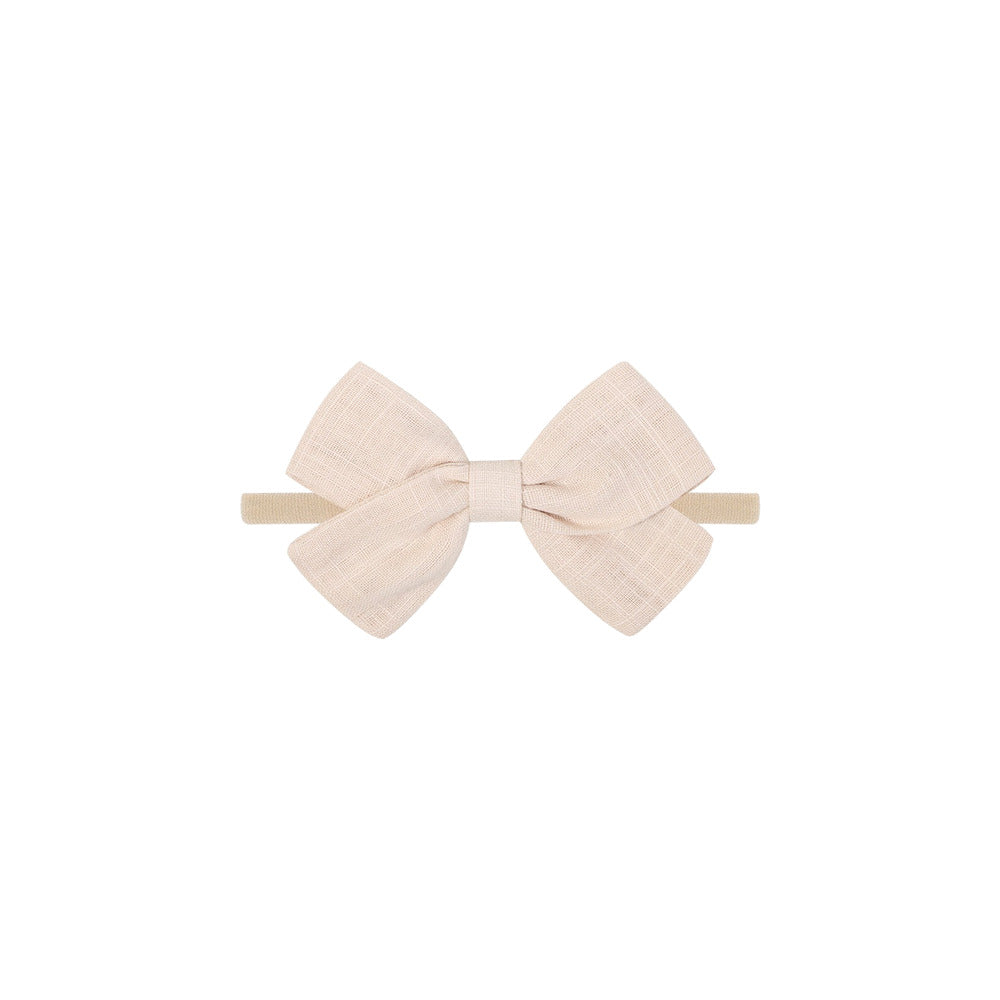 Tinka tiny bow baby headband in ivory