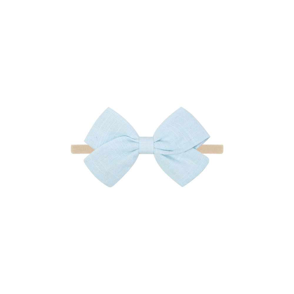 Tinka tiny bow baby headband in light blue