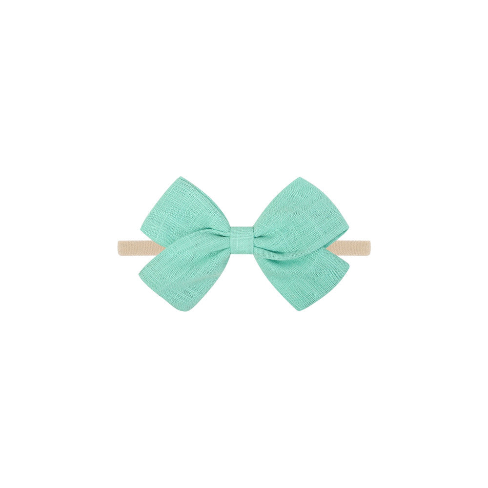 Tinka tiny bow baby headband in mint