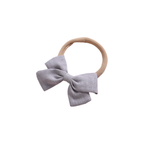 Tinka tiny bow baby headband in pale grey