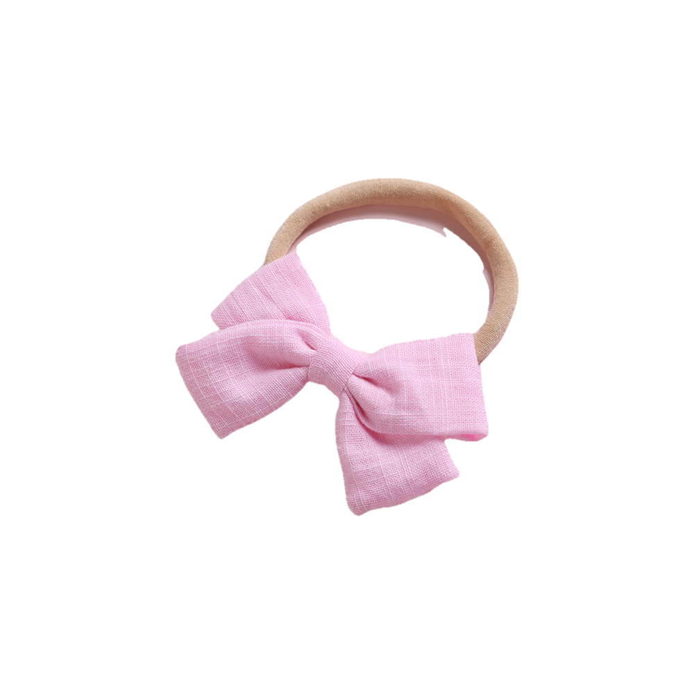 Tinka tiny bow baby headband in pink