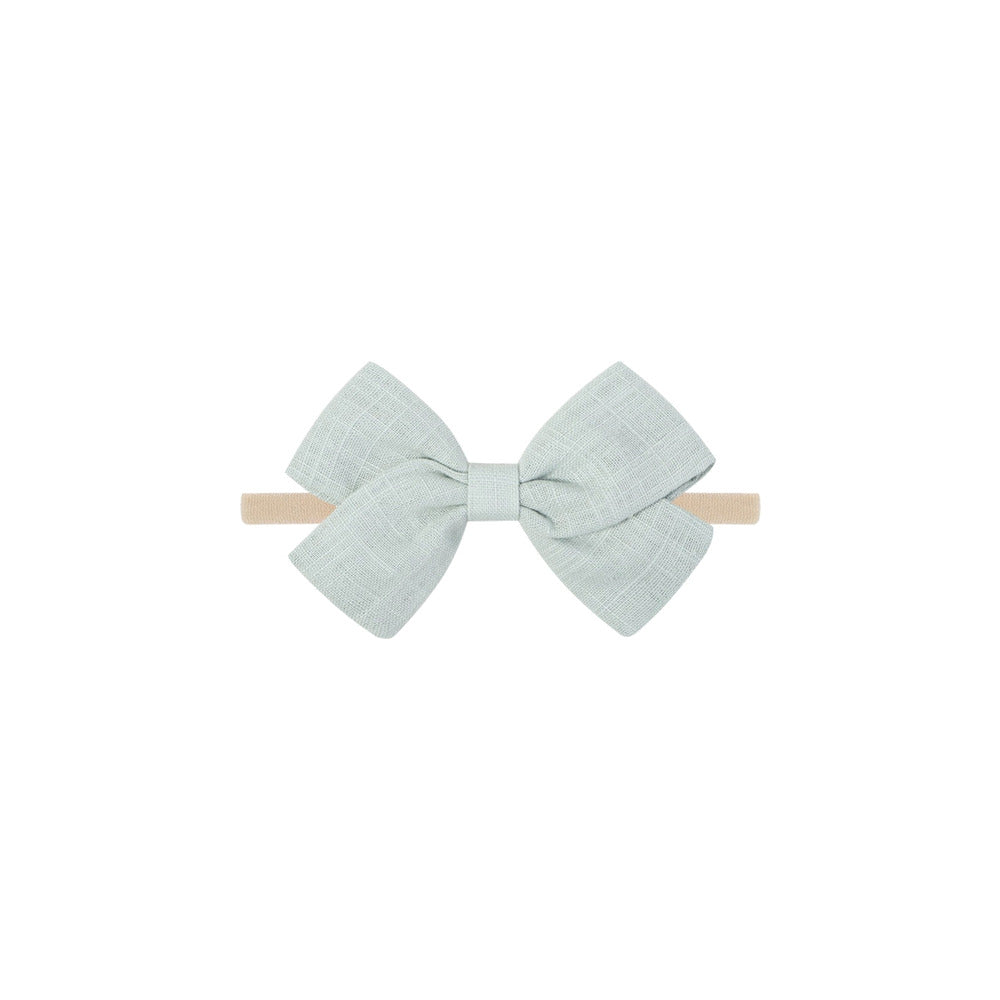 Tinka tiny bow baby headband in sage