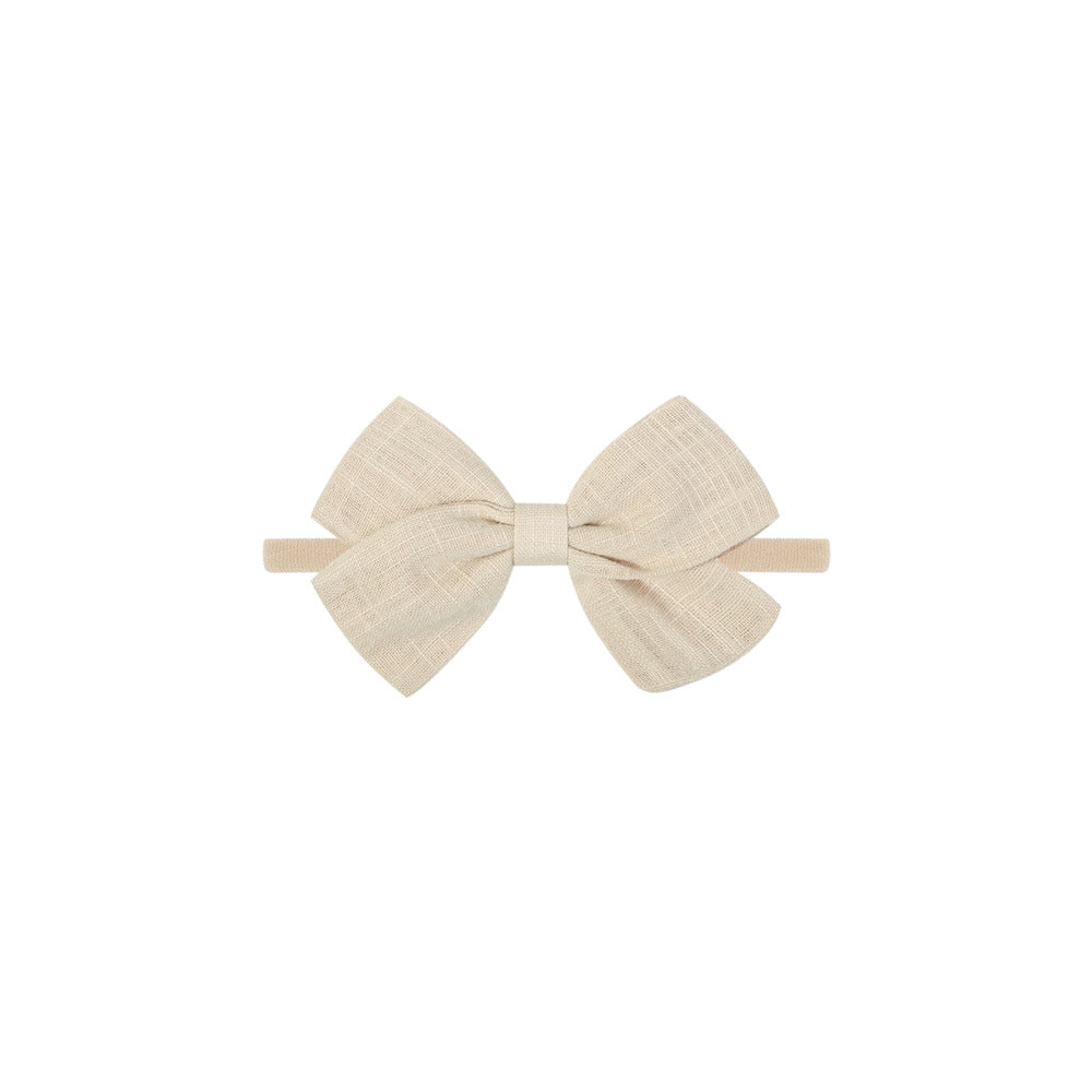 Tinka tiny bow baby headband in sand