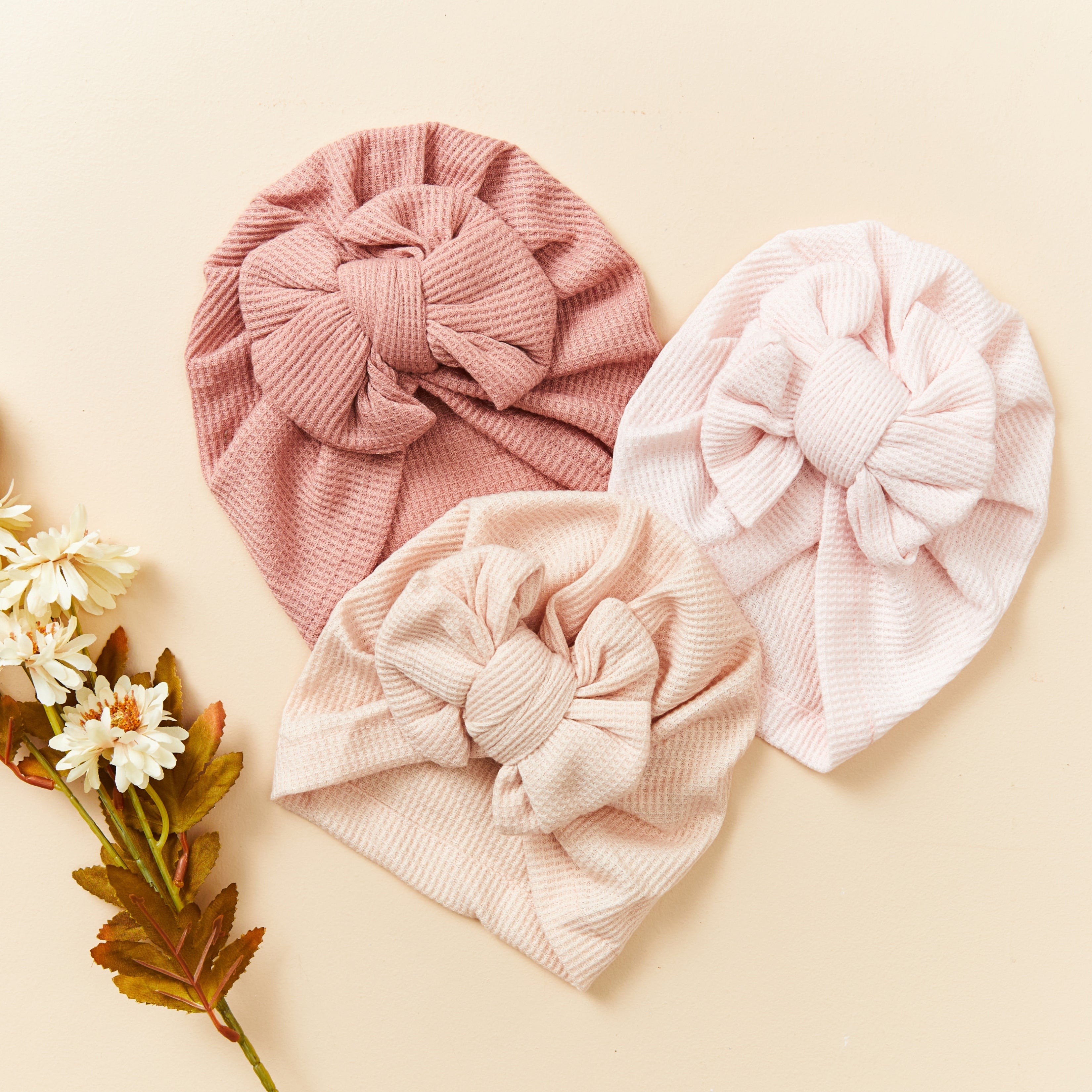 Newborn wearing navy baby turban with textured — Baby Girl Waffle Bow Turban