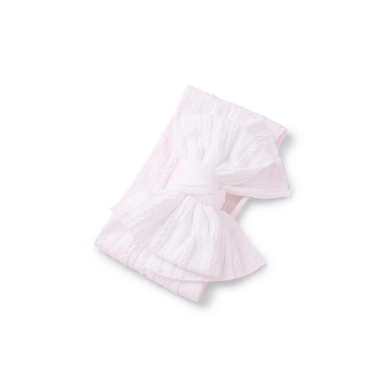 white ribbed knit baby headband with re-tieable oversized double bow, designed for newborns and toddlers